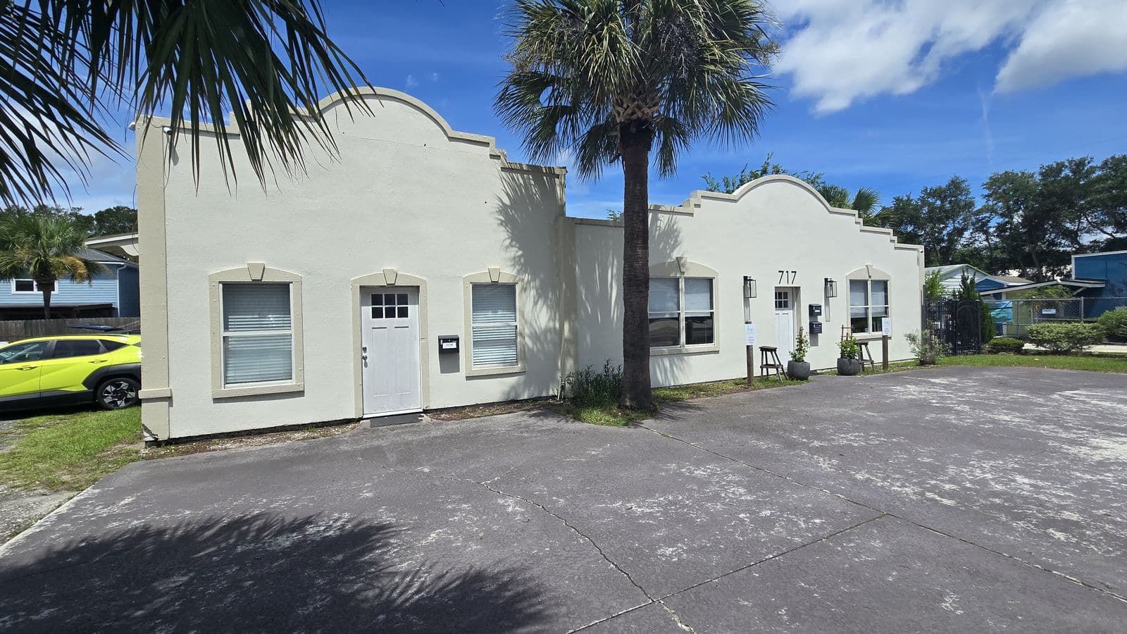 Single-story stucco commercial building at a property inspection