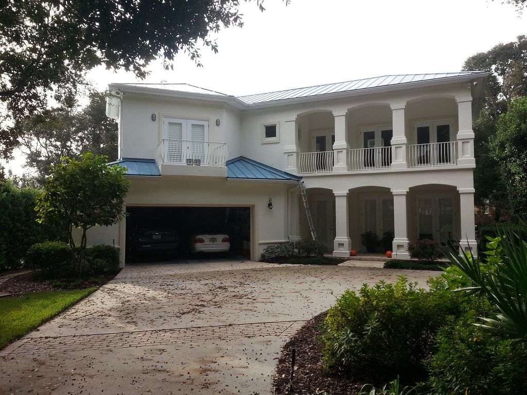 Two-story coastal home with balconies on Amelia Island